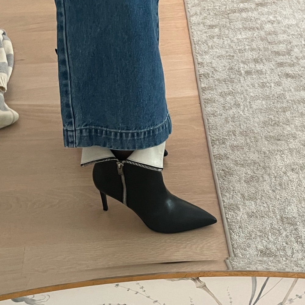YVES SAINT LAURENT WHITE AND BLACK ZIPPER BOOTS